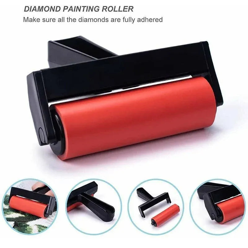 Diamond painting roller with red roller and black handle on a white background