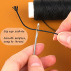 Person threading black thread through a needle with text on an orange background

Details
