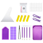 A 120-piece craft vinyl sticker kit laid out on a white background, including a white plastic squeegee, a ziplock bag of pink and white sticker sheets, yellow adhesive pads, purple clips, purple and white tools, and purple sticker sheets.