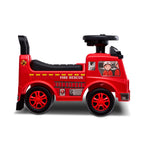 Red toy fire truck with a child figure inside on a white background