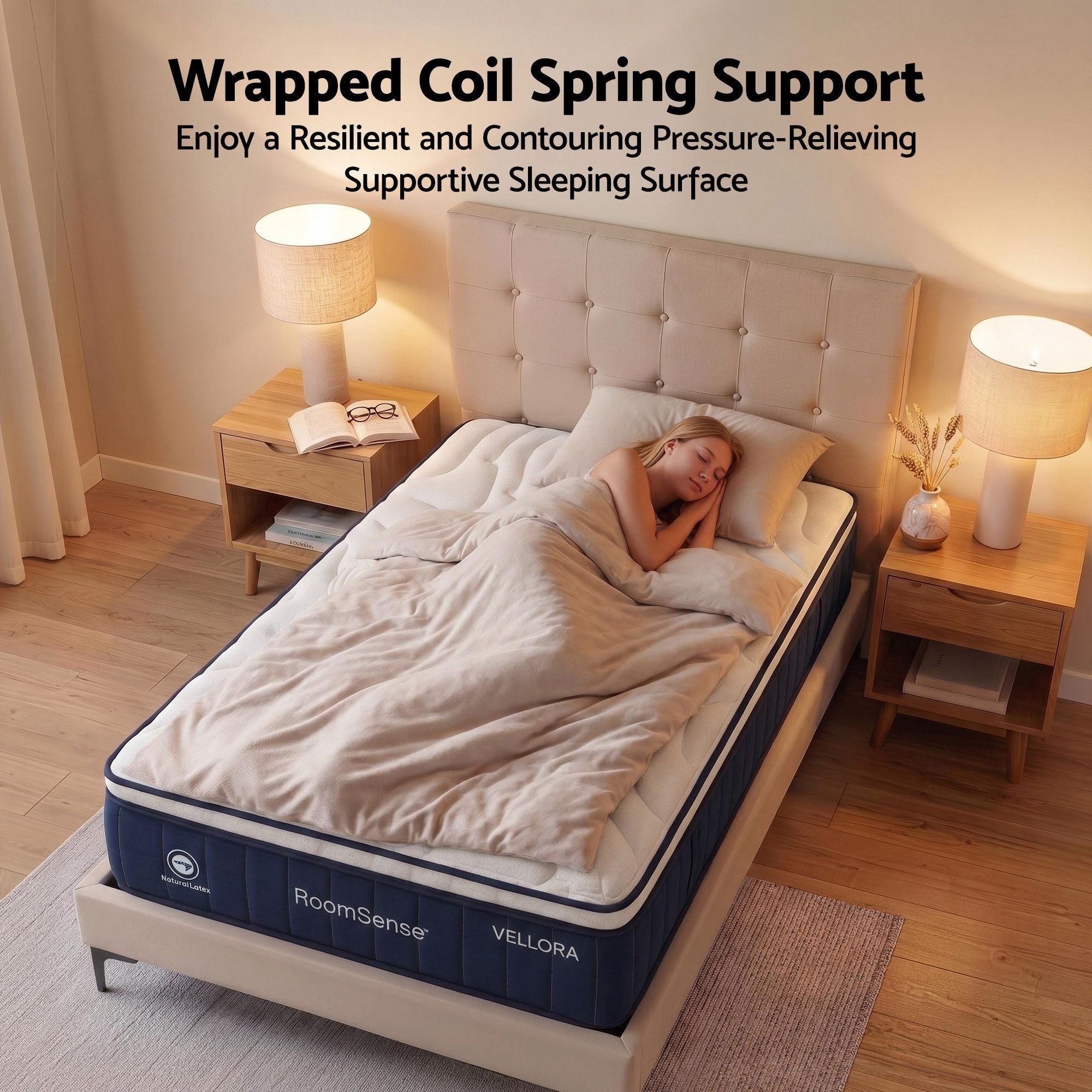 Woman sleeping on a Vellora mattress with 'Wrapped Coil Spring Support' text above.