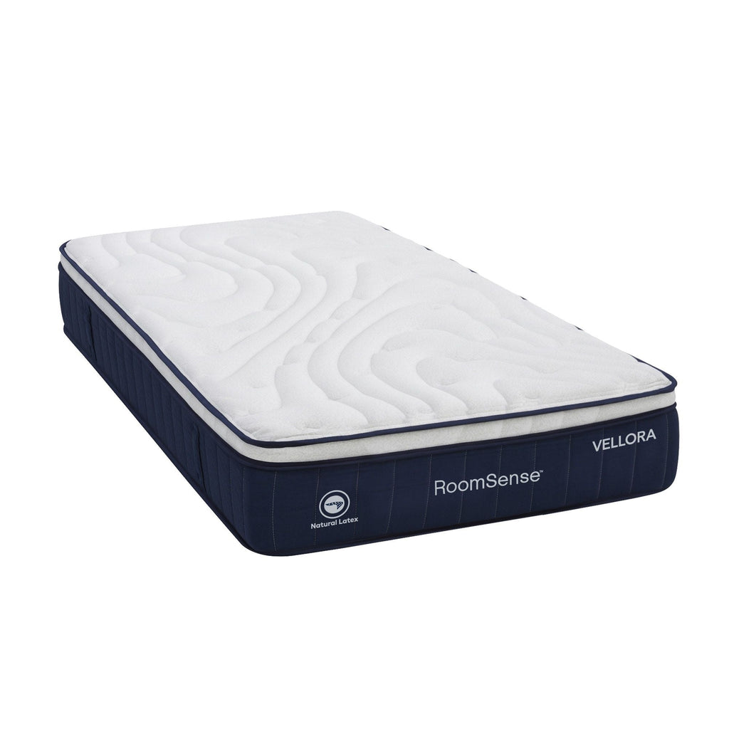Mattress with 'RoomSense' and 'Vellora' branding on a white background