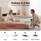 Man and woman unboxing a mattress from RoomSense in a bedroom setting.