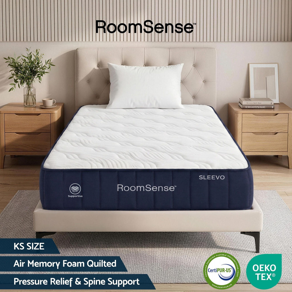 RoomSense mattress on a bed in a bedroom setting with 'RoomSense' branding.