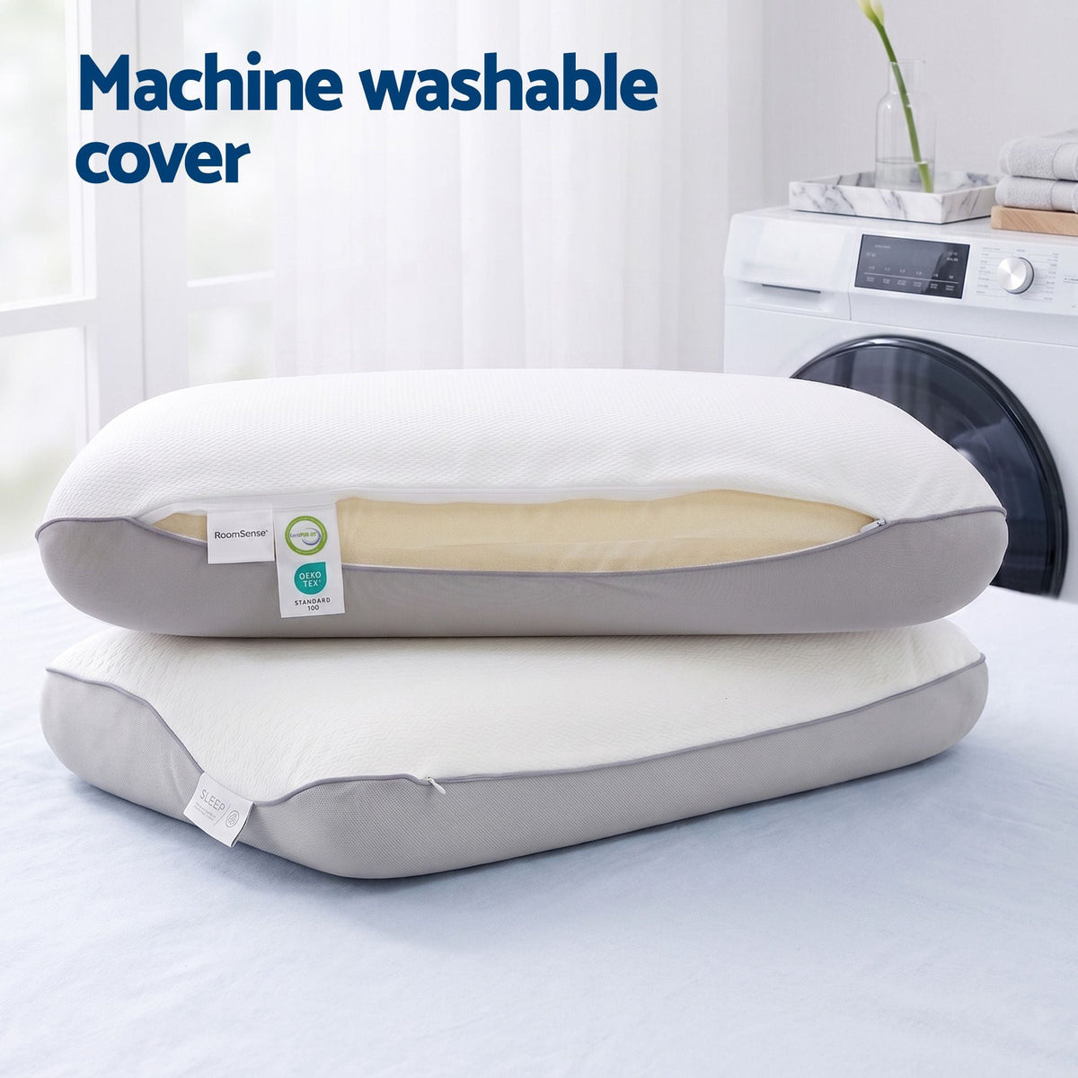 Two pillows with machine washable cover feature and washing machine in the background