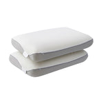 Two pillows stacked on a white background