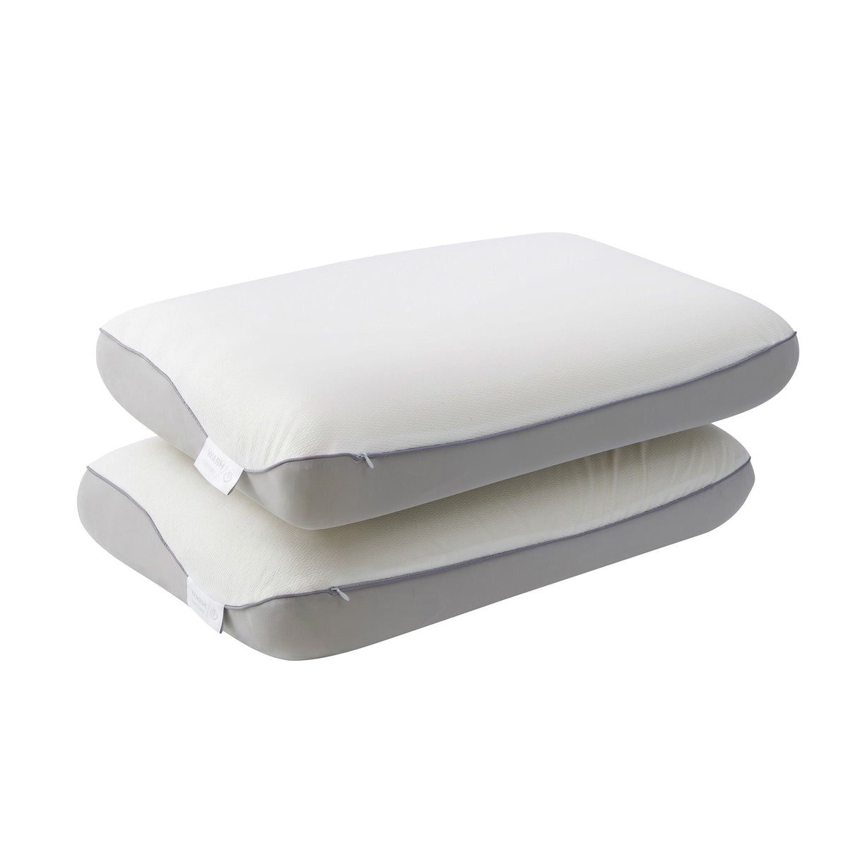 Two pillows stacked on a white background