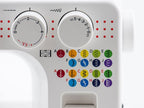 Close-up of a white sewing machine control panel showing two white dials, red dot markings, and a grid of colorful thread type icons labeled A through J.