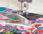 see the Ruler foot  sewing around a curved piece of fabric